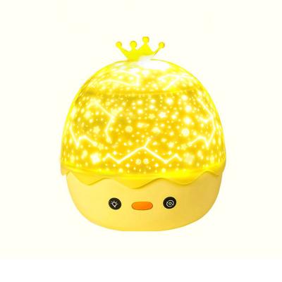 China Smart Light Duck Star Projector Christmas Birthday Night Light Rechargeable Projection Lamp Sensor Control Crown Rotation for sale