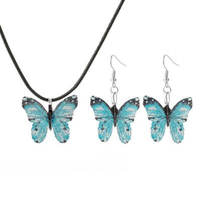 China Cute Creative Personality Painted Butterfly Set Real Specimen Color Pendant Dangle Earrings Connected Female Set for sale