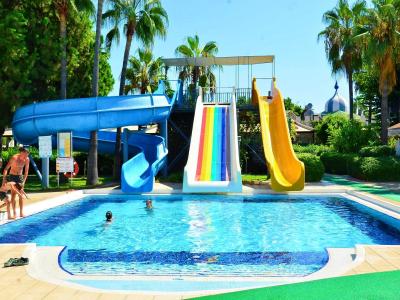 China Commercial Huge Water Park Swimming Pool Equipment Design Water Fiberglass Slide for sale