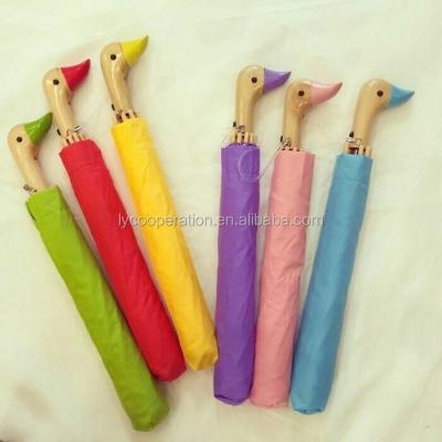 China Nylon Wooden Umbrella Duck Handle for sale