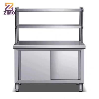 China Modern Simple heavy duty food grade stainless steel double doors storge kitchen table steel work bench with drawers for sale