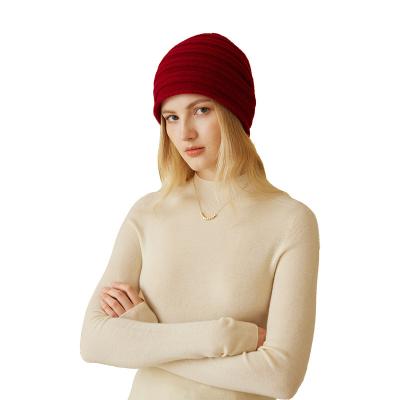 China Have 2023 Wholesale High Quality Winter Heat Preservation Mens Womens Cashmere Beanie Hat With Patch Leather Label for sale