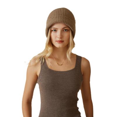 China Bearing heat preservation 2023 hot sale fashion unisex women men sport winter custom knitted 100% cashmere beanie hat and cap with logo for sale