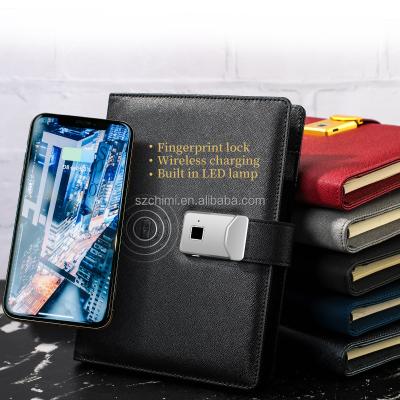 China 2021 hardcover Christmas gift set wireless fingerprint lock designer notebook with reading lamp led smart notebook with powerbank notebook for sale