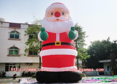 China Surfing Santa Claus Inflatable Cartoon Characters With Commercial Sewing / Welding for sale