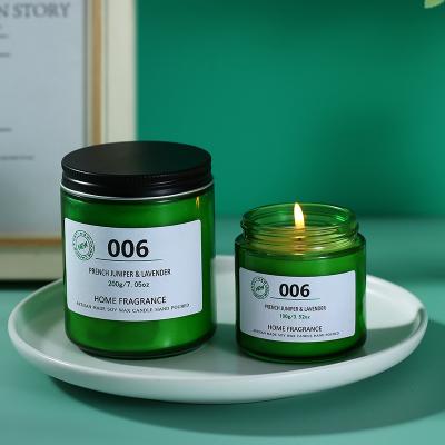 China Luxury Unique Candles Scented Luxury Soy Wax Candle With Green Glass Jar for sale