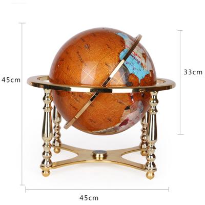 China Teaching and Decoration Udnique Art Tall Pearl Lazulite Ocean Gemstone Globe with Tripod Gold Stan for sale