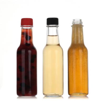 China Woozy Square Glass Juice Bottles Empty Glass Ketchup Bottle 10Oz for sale