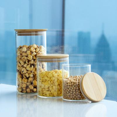 China Eco-friendly High Borosilicate Food Airtight Kitchen Glass Storage Jars With Bamboo Wooden Lids for sale