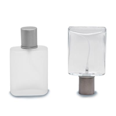 China Custom Square Perfume Bottle 30ml 50ml 100ml Clear Color Perfume Glass Bottles for sale