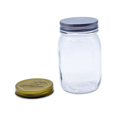 China Free Sample 32oz Glass Canning Jars Glass Mason Jar with Metal Lid for sale