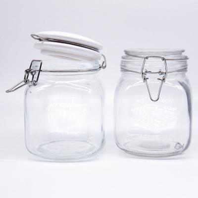 China Clear Short Type 100ml 150ml 200ml Glass Pickle Butter Jar with Metal Buckle Clip Lid for sale