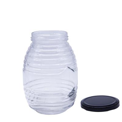 China Personalized Custom 2Oz 3Oz 100Ml 500Ml 1000Ml Transparent Glass Honey Jar With Metal Lid for sale