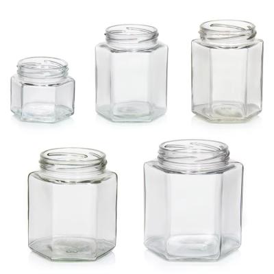 China High Quality 2Oz 3Oz Transparent Round Clear Glass Honey Jars For Honey With Color Lids for sale