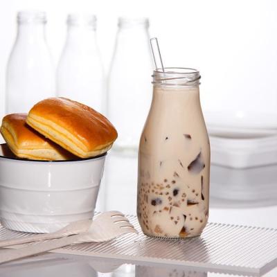 China Lead Free French Round 25Oz 32Oz Glass Fresh Milk Bottles For Iced Drinks for sale