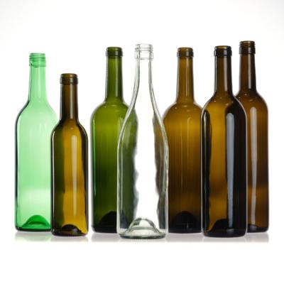 China Empty 750Ml Clear Amber Green Round Glass Bordeaux Wine Bottles With Cork Stopper Lid for sale