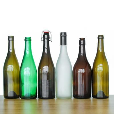 China Glass Wine Bottle 750ML Amber Green Transparent Empty Round Belly Shape for sale