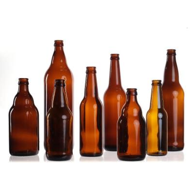 China Wholesale Empty 330ml 33cl 12oz Soda Or Juice Clear Beer Glass Bottles With Lid for sale