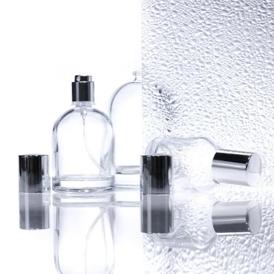 Cina Flasche di profumo di vetro rotondo di lusso da 30 ml 50 ml 100 ml con pareti spesse quadrate con tappi di legno e scatole di design personalizzato in vendita