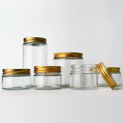 China Factory Supply  8oz 12oz  Empty Clear Candy Round Containers Glass Jars With Gold Metal Lids for sale