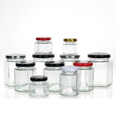 China Empty Honey Bottle Glass Mini Hexagonal Honey Jar 500ml 380ml 180ml 90ml 45ml With Lid for sale