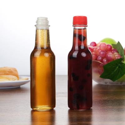 Cina Factory Wholesale 5 Oz 8 Oz Woozy Bottles Ketchup Pepper Sauce Glass Bottle With Pp Lid in vendita