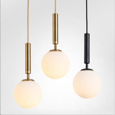 China Big head three head creative personality bedroom bedside glass ball creative pendant light Nordic modern simple modern small chandeliers for sale