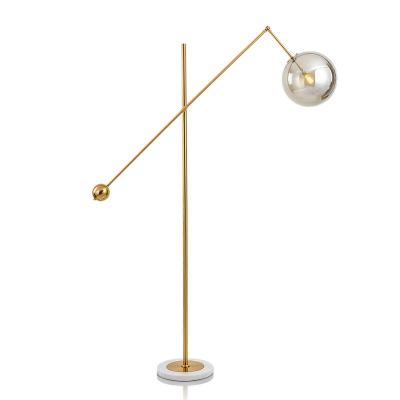 China HOOYI Modern Design Low Floor Lamp Glass Ball Lamp Marble Shape Floor Lamp For Living Room for sale