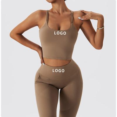 China Breathable Custom Logo Yoga Set Simple But Unique Sexy Stylish Back Yoga Bra Top Matching Fitness Training Leggings Soft Skinny Yoga Set for sale