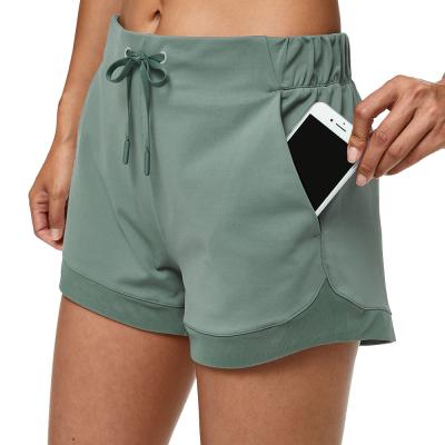 China Women Summer Loose Quick Dry Athletic Sports Workout Shorts With Pockets for sale