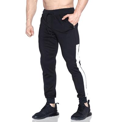 China 65% Cotton Drawstring Black Training Sportswear Joggers Men'S Running Pants for sale