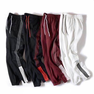 Chine Taqueurs 100% de pantalon de survêtement de polyester 6 survêtements de sport d'hommes de pantalons de poche à vendre