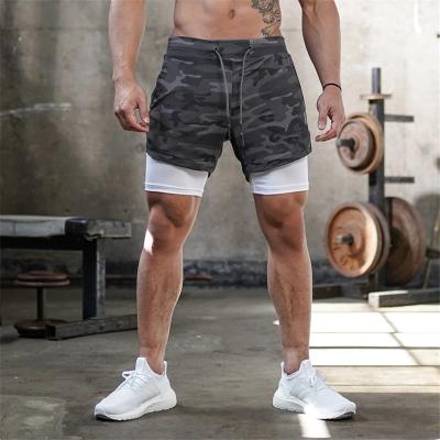 China Elastic Waist Compression Workout Shorts Male Mesh Athletic Shorts With Pockets for sale