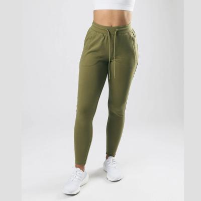 Chine Le pantalon de survêtement Streetwear des hommes de taqueurs de vêtements de sport de blanc de mouche de tirette à vendre