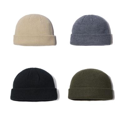 China Fashion COMMON wholesale plain elegant plain soft simple winter winter rounded beanie hat customized embroidery logo multiple colors for sale