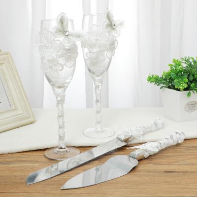 China New Fashional Style Wedding Knife And Cake Server Set Knife Shovel Wine Glass Set Resin Steel Handle With Burlap for sale