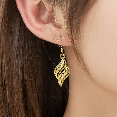 China CLASSIC European and American hot-selling earrings temperament twisted diamond inlaid hollow spiral simple metal geometric earrings for sale