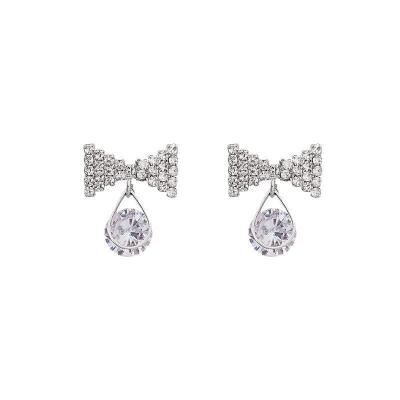 China 2022 New S925 Needle Full Diamond Super Flash Fashionable Crystal Earrings New Pop Silver Bow Earrings for sale