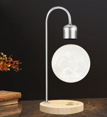 China Modern Magnetic Floating Moon Levitating Modern Magic Levitating Base Lamparas Light Air Base Table Levitation Wholesale Lamps for sale