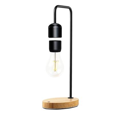 China Large Innovative Products Europe Inventions New Levitating Instruments Bulb Base Wooden Desk Lamp for sale