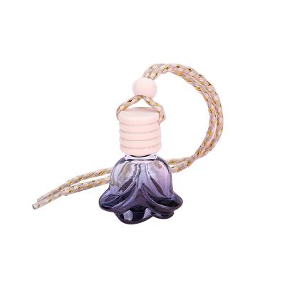 China Wholesale Recyclable Eco-friendly 8ML Underbottling Black Hanging Rope Car Perfume Bottle Cover Essential Oil Diffuser Wood Perfume Bottle for sale