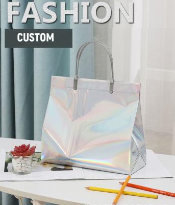 China Purchasing a high quality PVC laser handbag color thick waterproof logo plastic laser rainbow holographic leisure bag one should for sale