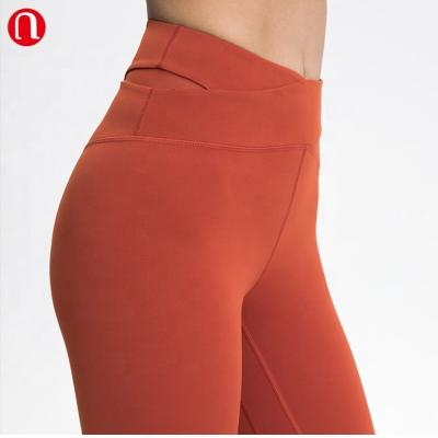 China Luluyun Breathable Women Nylon Spandex High Waist V Shape Workout Belt Gym Workout Tummy Control Gaiters Back Pocket Pants for sale