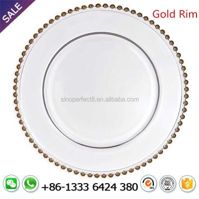 China Wholesale Disposable Clear Glass Beaded Charger Dish With Gold Rim Lace Reef For Wedding Table Decoration for sale