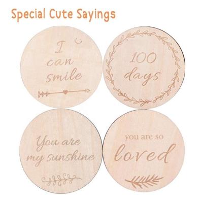 China Natural Material Wooden Baby Gifts Monthly Milestone Baby Photography Newborn Props Double Sided Engraved Discs for sale