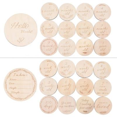 China Best Baby Milestone Monthly Natural Material Wooden Baby Gift Cards Newborn Photography Props Double Sided Engraved Discs for sale