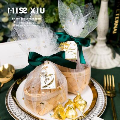 China Lovely Girl Handmade Bridesmaid Heart Wind Portable Bamboo With Hand Gift Basket New Style Wedding Candy Bow Pearl Text Pastoral Gift Box for sale