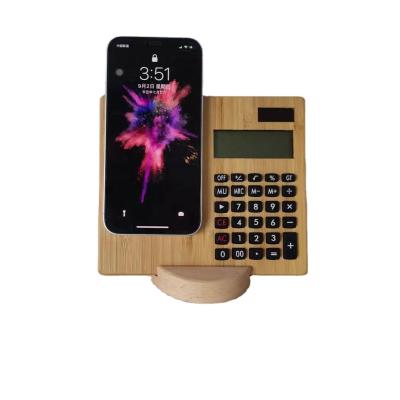 China Magnetic Bamboo Wooden Tablet 15W Fast Charging Wireless Charger With Calculator for sale