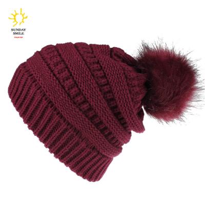 China 2021 New Arrival COMFORTABLE COMFORTABLE Bulky Factory Wholesale Yarn Knitted Fur Pom Poms Winter Beanies Hat For Women for sale