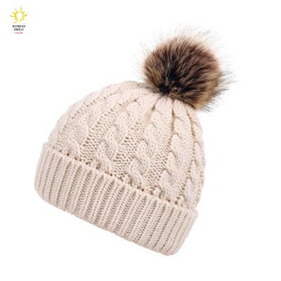 China COMMON Warm Hat Ski Winter Faux Fur Pompom Logo Skull Cute Ribbed Knitted Acrylic Beanie Hat Wholesale With Soft Custom Brand COMMON For Women for sale